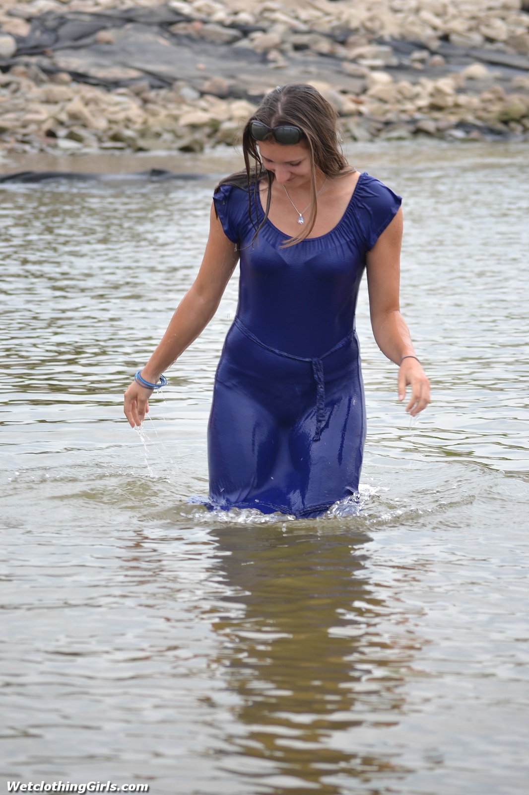 New girl Martyna in a very tight blue dress looks great when soaked! 
